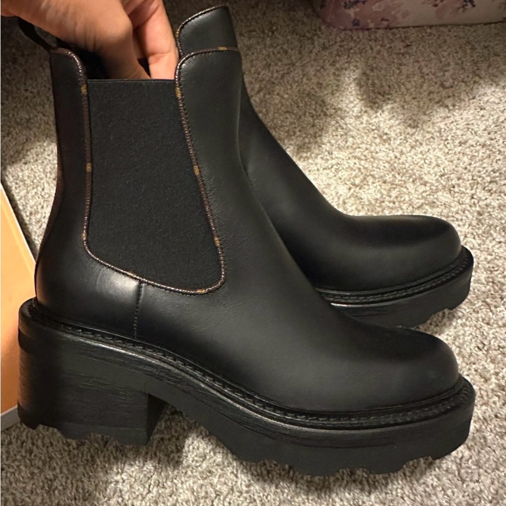 Louis Vuitton employee boots